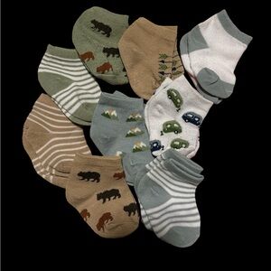 NWOT 9 piece set Wilderness socks 0-6 months